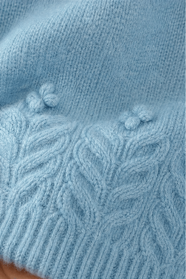 Zopfmuster Rundhals Strickpullover mit Blumendetails am Saum