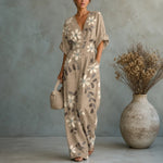 Solene V-Ausschnitt Jumpsuit mit weitem Bein und gebundener Taille