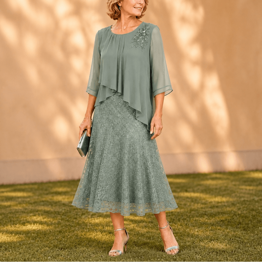 Elegantes Midikleid mit Spitzenoverlay und Chiffonärmeln