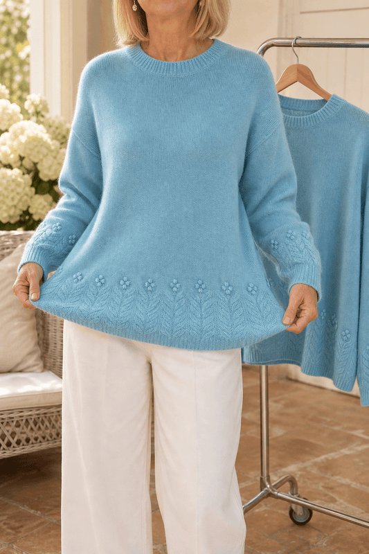 Zopfmuster Rundhals Strickpullover mit Blumendetails am Saum