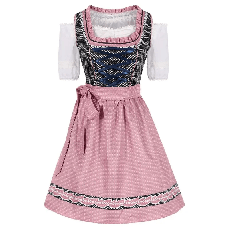 Gepunktetes Dirndlkleid mit Schürze und Schnürmieder als Trachtenmode für Damen