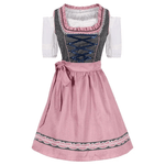 Gepunktetes Dirndlkleid mit Schürze und Schnürmieder als Trachtenmode für Damen