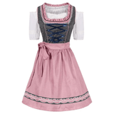 Gepunktetes Dirndlkleid mit Schürze und Schnürmieder als Trachtenmode für Damen