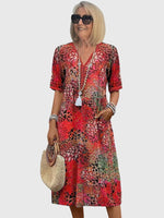 Florales Bohemian Midikleid mit V-Ausschnitt und Taschen