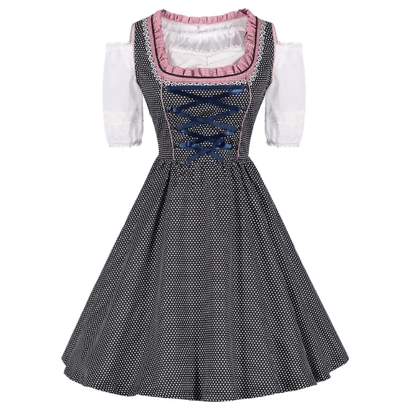 Gepunktetes Dirndlkleid mit Schürze und Schnürmieder als Trachtenmode für Damen