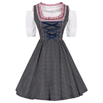 Gepunktetes Dirndlkleid mit Schürze und Schnürmieder als Trachtenmode für Damen
