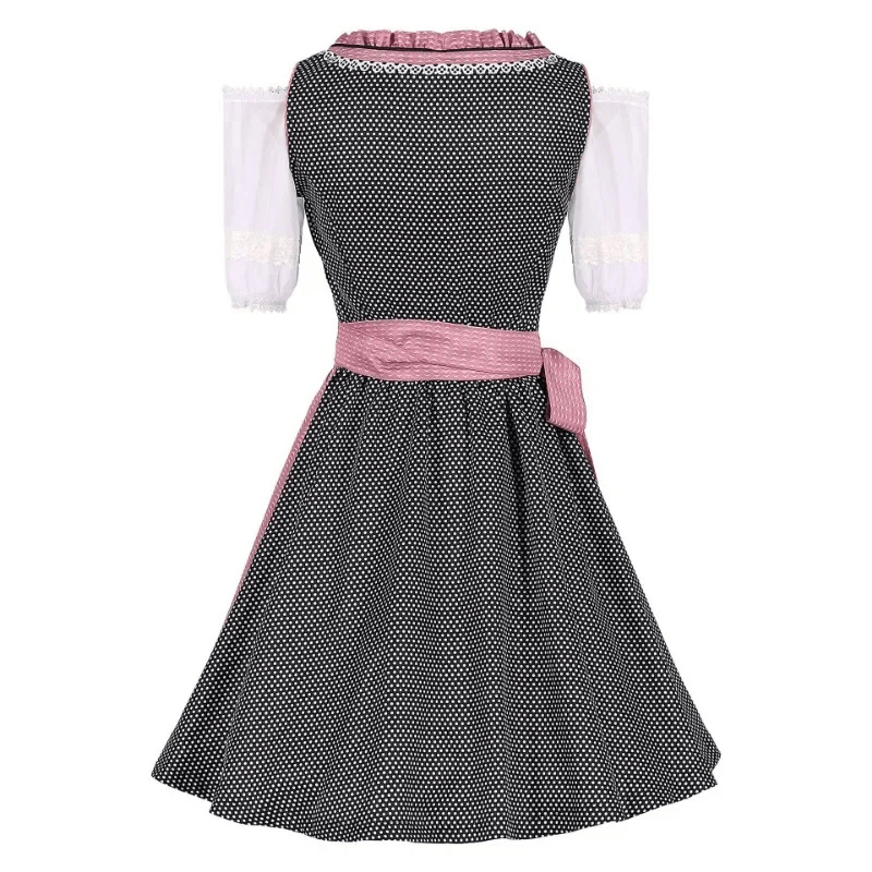 Gepunktetes Dirndlkleid mit Schürze und Schnürmieder als Trachtenmode für Damen