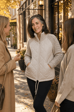 Damen Steppjacke mit Strickbesatz an Bund Ärmeln und Kragen im Patchwork-Design