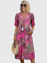Florales Bohemian Midikleid mit V-Ausschnitt und Taschen
