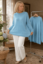 Zopfmuster Rundhals Strickpullover mit Blumendetails am Saum