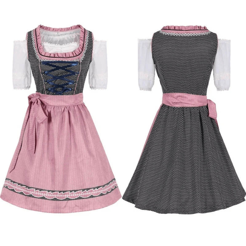 Gepunktetes Dirndlkleid mit Schürze und Schnürmieder als Trachtenmode für Damen