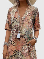 Florales Bohemian Midikleid mit V-Ausschnitt und Taschen