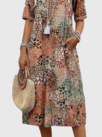 Florales Bohemian Midikleid mit V-Ausschnitt und Taschen
