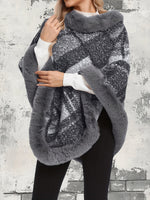 Langer Poncho-Pullover mit Fellimitatbesatz im Karo-Design